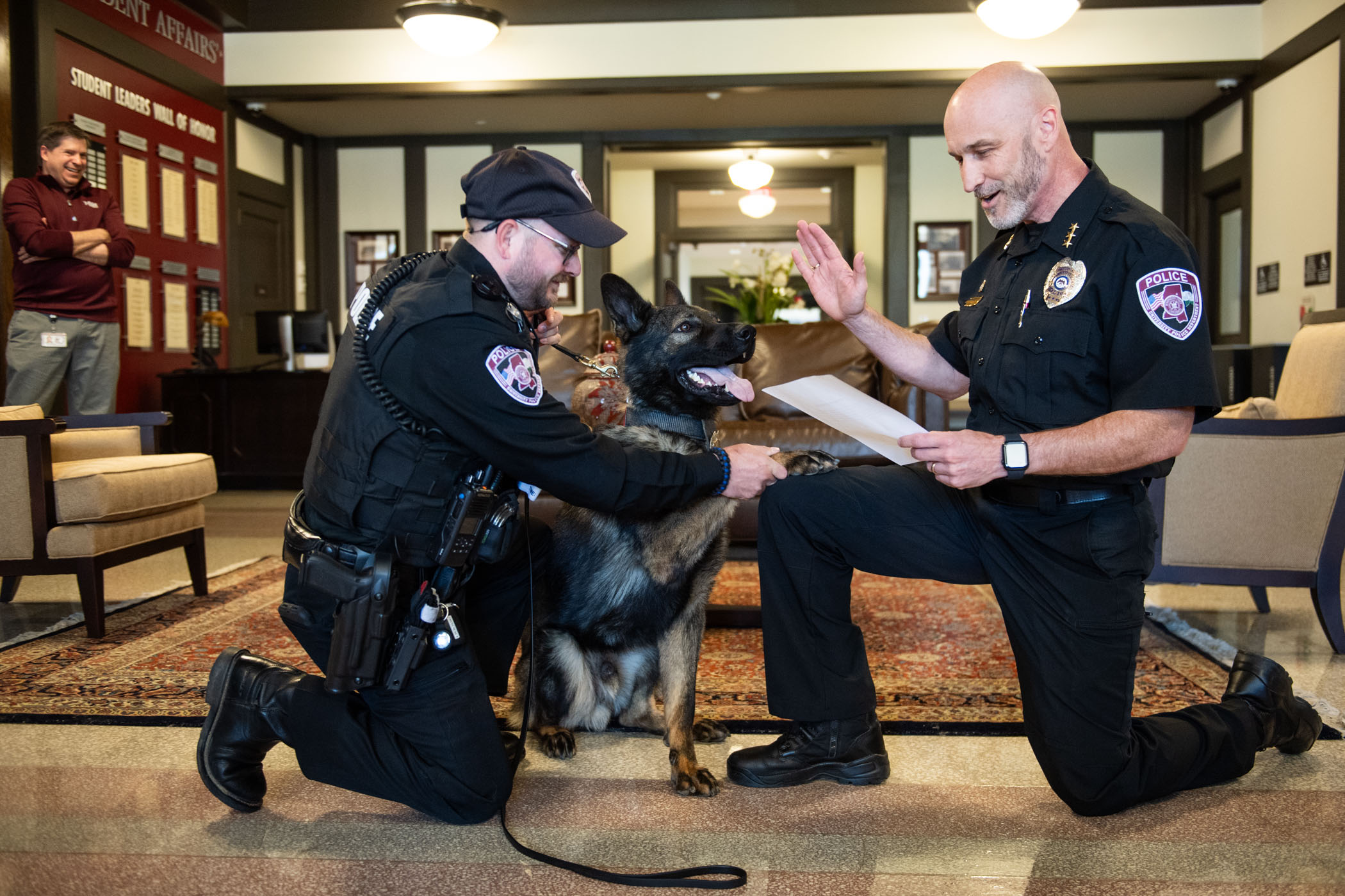 K9 Bash was welcomed and celebrated this weekend as the newest member of the ֱ Police Department. Trained in Arkansas for his work with his handler, ֱPD Officer Bradley Frost, left, Bash was sworn in by Assistant Police Chief Brian Locke, as the newest squad member.